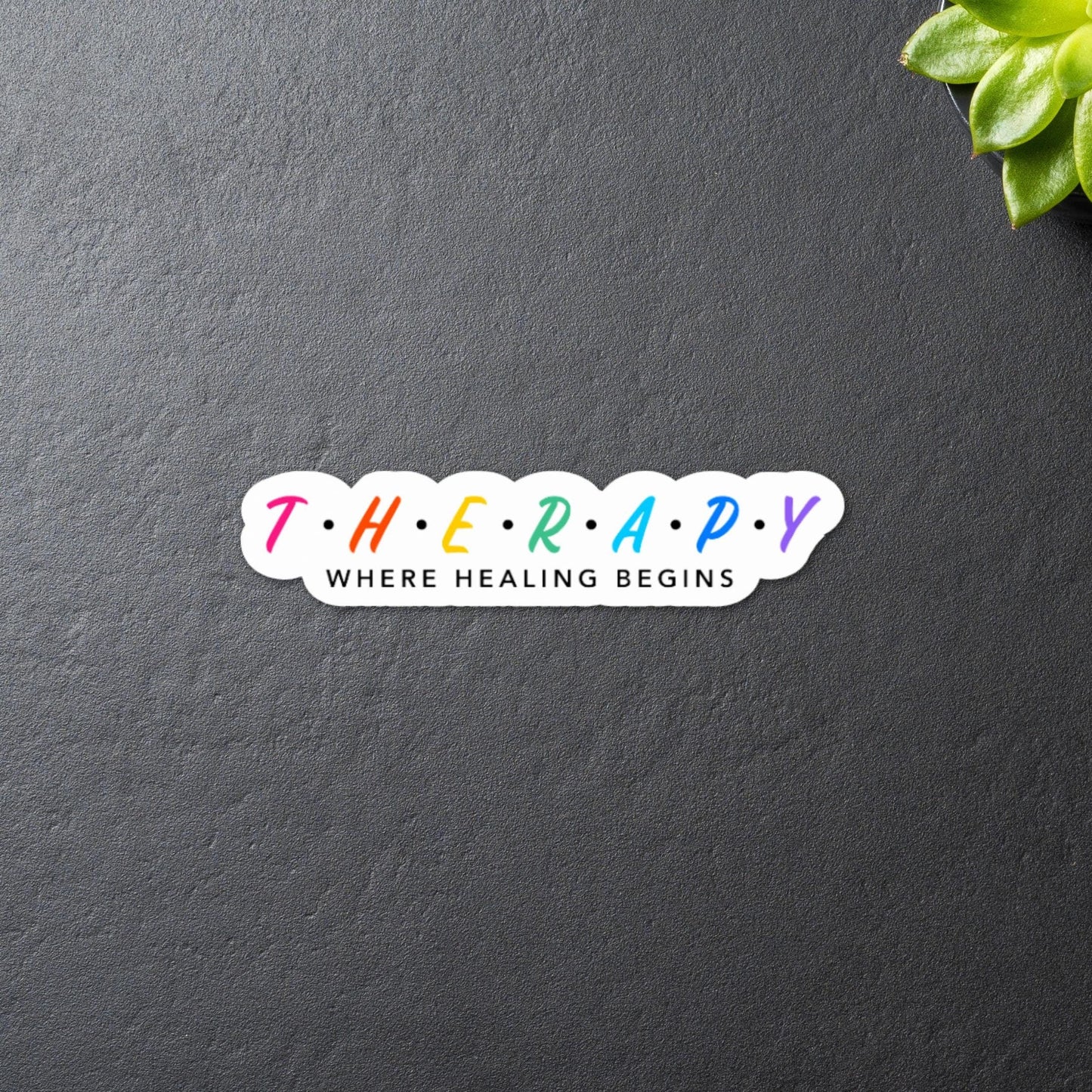 Therapy Where Healing Begins - Inspirational Sticker. On a black background, front view, close up.