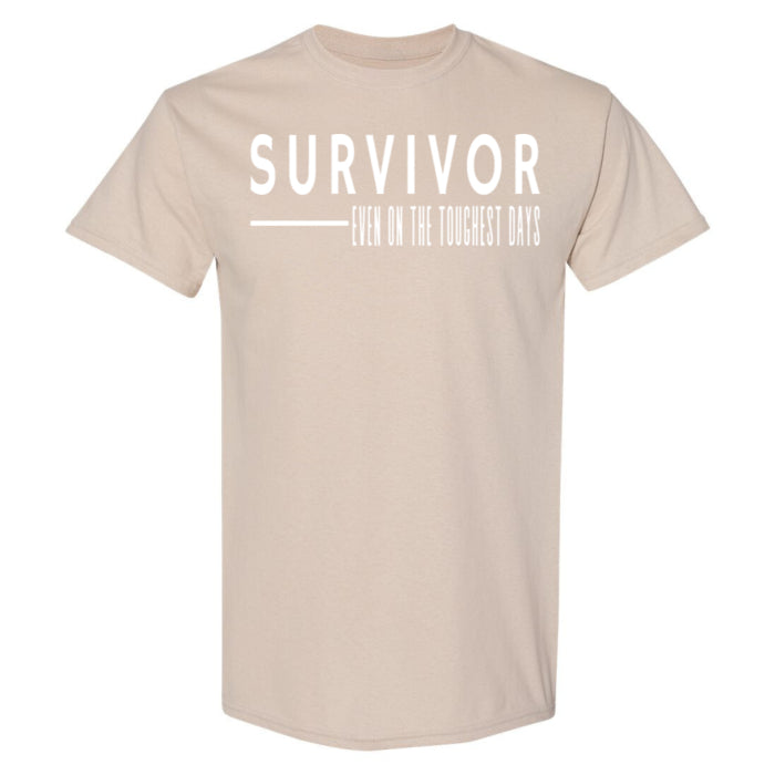 Trendy short sleeve sand cotton t shirt for women, with text-based Survivor quote.