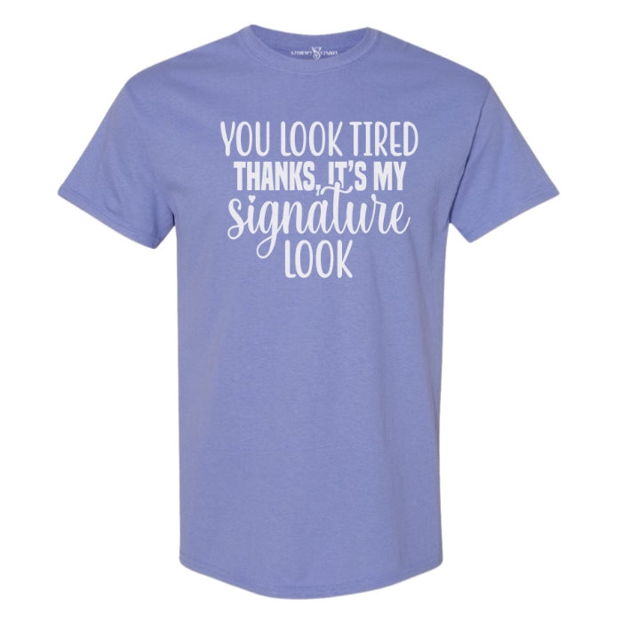 You Look Tired Sarcastic Mental Health T-shirt. Violet short sleeve shirt frontal view on white background.