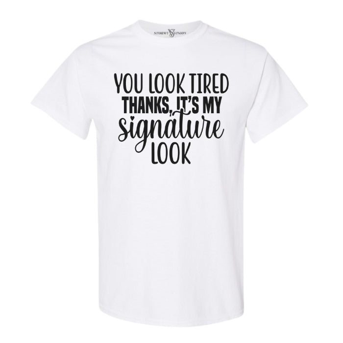 You Look Tired Sarcastic Mental Health T-shirt. White short sleeve shirt frontal on white background.