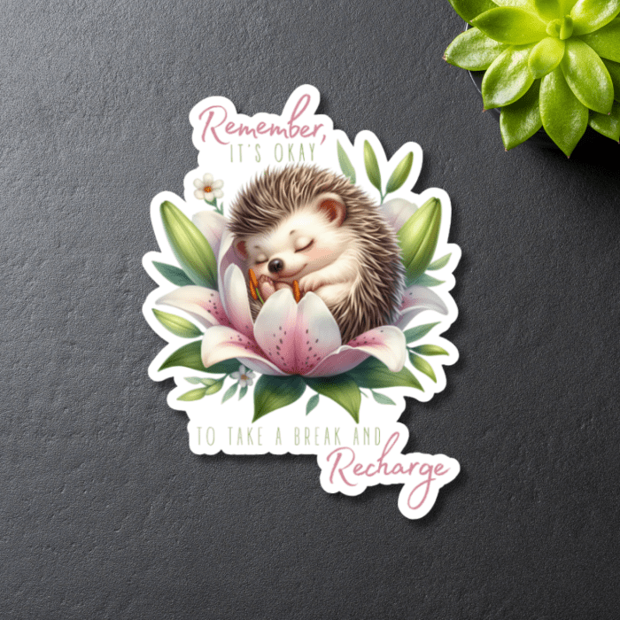 close up of baby animal sleeping in flower bed with inspirational quote