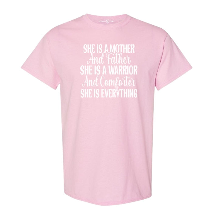 She Is Everything Inspirational Light Pink T-shirt for mothers. Short Sleeve with  white bold and cursive font on a white background front view.