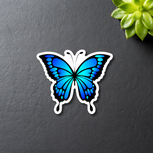 vibrant blue and teal gradient butterfly sticker close up on black background