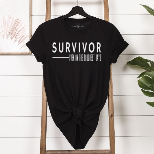 Basic high quality black cotton tee for women, with inspirational Survivor quote in bold white font. Great for trauma survivors and mental health advocates.