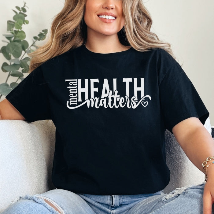 Cost friendly inspirational graphic tees, for all body types and genders, that offer uplifting and positive mental health quotes and slogans.