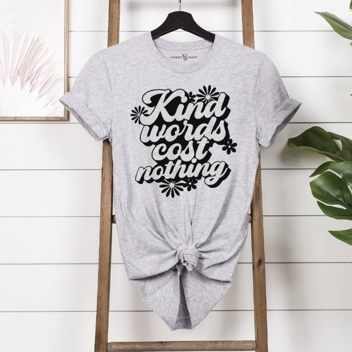 Retro-inspired t-shirt with Kind Words slogan, featuring a floral design, perfect for a relaxed fit for everyday comfort.