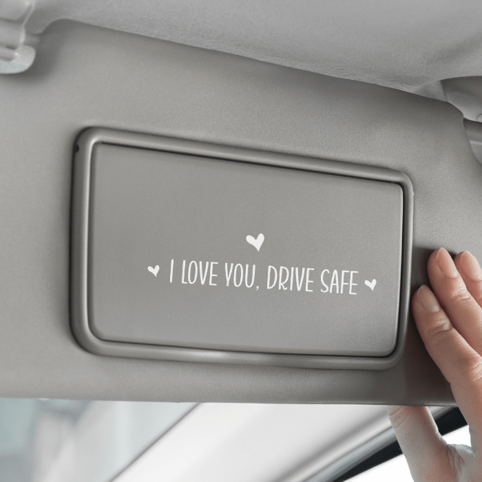 White "I Love You, Drive Safe" Decal: Simple yet heartfelt message for safe travels.