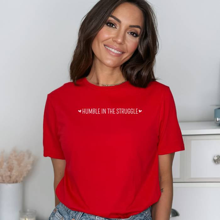 Humble in the Struggle 100% cotton crew neck t-shirt, with dainty heart elements. Ideal for those looking for a cheap t-shirt with high quality and low cost.