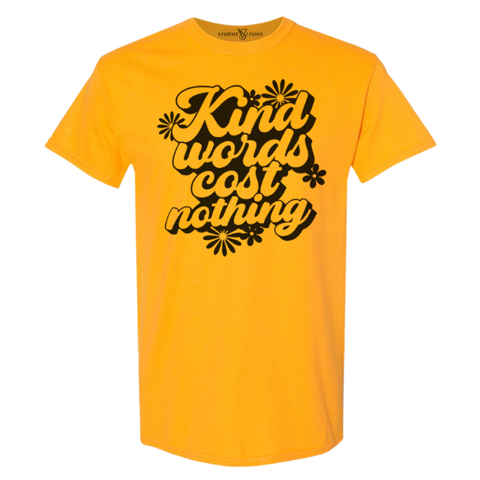 Women's colorful gold and black graphic tee, showcasing a Kindness quote with retro font and floral accents. Perfect for anyone who values mental health, versatile for seasonal wear.
