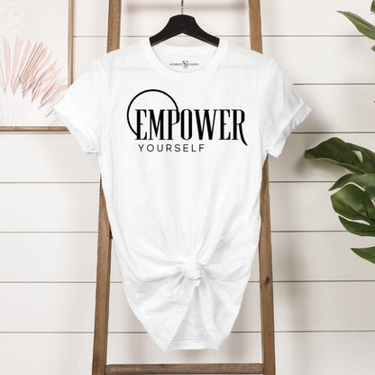 Women's trendy white t-shirt with Empower Yourself in bold black font, perfect for empowering women and self-care advocates.