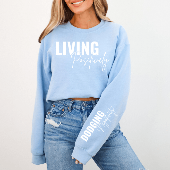 Positivity Mindset Clothing For Women - Trendy light blue mental health inspired pullover sweater. ideal for casual outfits, pairs well with comfy pants.