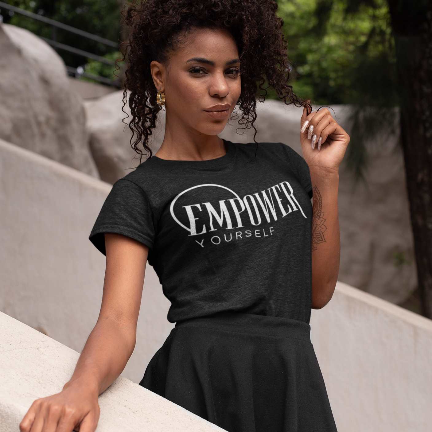 Woman wearing an black inspirational Empower Yourself T-Shirt - Stormy Vision